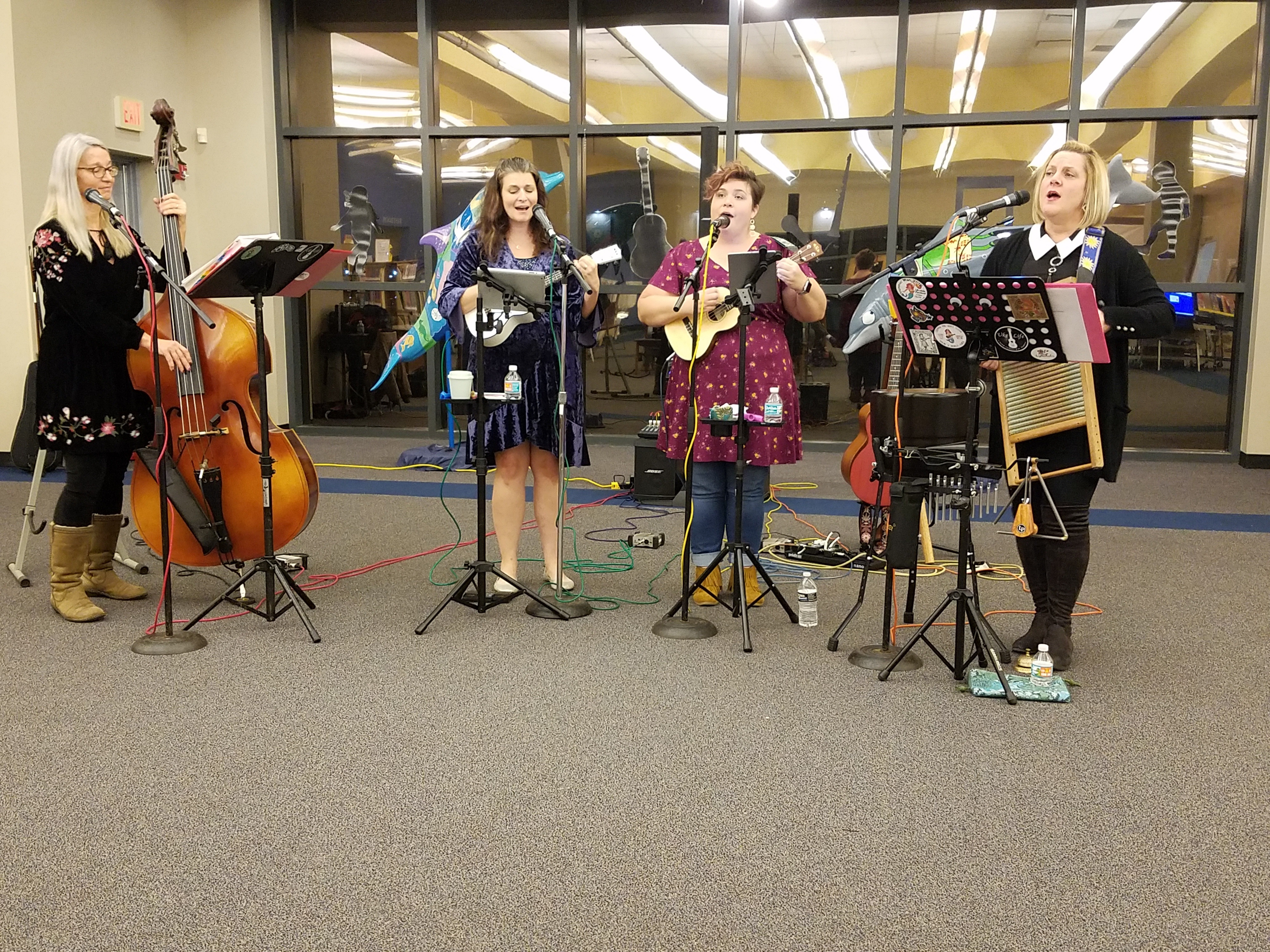 Photograph of musical group Wabi Sabis playing at the library